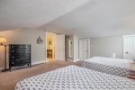 Upstairs bedroom with two queen beds